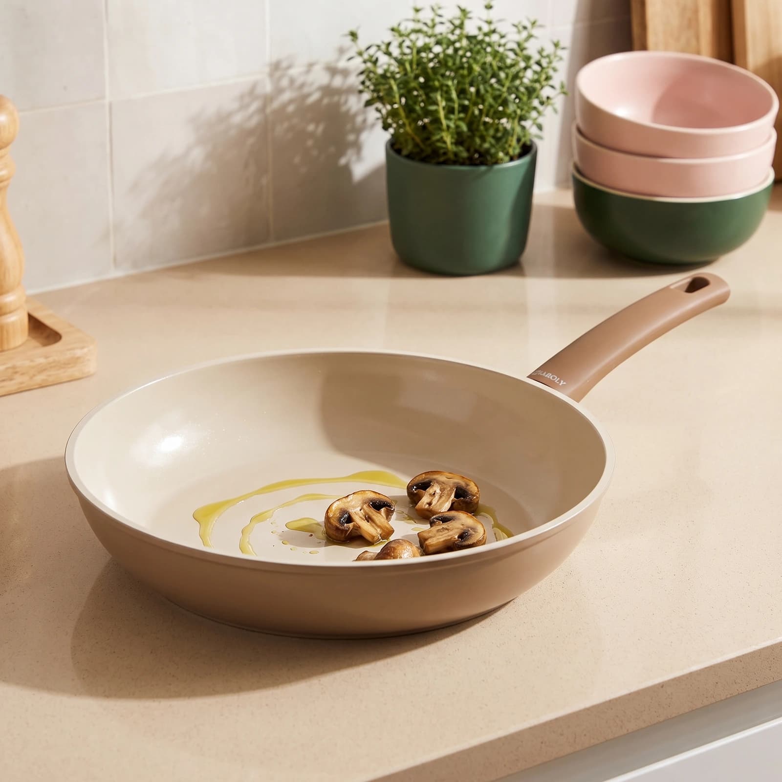 Beige ceramic frying pan with a brown handle, 28cm, non-stick, on a white background.