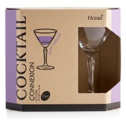 Clear glass martini cocktail glass with a faceted stem, shown with its brown and purple packaging for a set of 2. - view 3