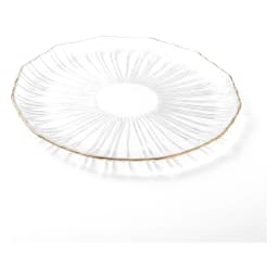 Three clear ribbed glass plates with gold rims, one large and two small, holding berry tarts on a kitchen counter. - view 4