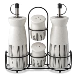 Cream porcelain oil and vinegar dispensers with two matching salt and pepper shakers in a black metal stand, black vertical… - view 2