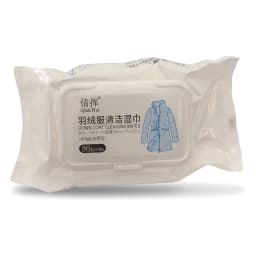 White plastic pack of down coat cleaning wipes with a blue illustration of a winter jacket on a white styrofoam surface - view 2