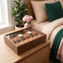 Dark brown wood watch storage box with a clear glass lid, 12 individual light brown velvet-lined compartments, and a gold-to… - view 1