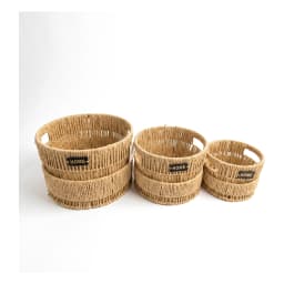Set of three round natural khous woven storage baskets with 'HOME' tags, varying in size, on a white background. - view 2