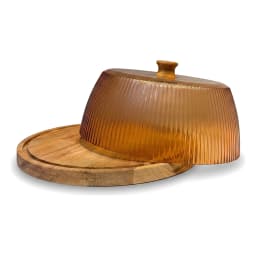 Round wooden base with a ribbed amber acrylic cake dome lid, displaying cheese, crackers, grapes, and figs on a kitchen coun… - view 2