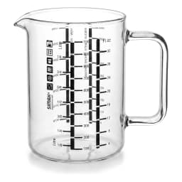Clear glass measuring jug with a handle and spout, marked with black measurements for litres and fluid ounces, on a white ba… - view 2