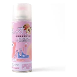 Pink aerosol spray can for shoes with a peach illustration and Japanese text, 260ml volume, on white styrofoam - view 2
