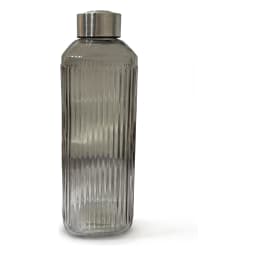 Tall smoked grey ribbed glass bottle with a silver metallic cap, standing upright in white foam packaging. - view 2