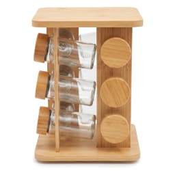 Light brown wood rotating spice rack with 9 clear glass jars and matching wooden lids, on a white background. - view 2