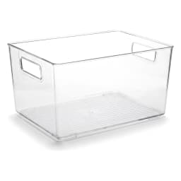 Clear rectangular acrylic storage bin with integrated handles and ribbed bottom, placed on a white shelf. - view 2