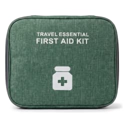 Green fabric travel first aid kit bag with a white medical cross icon, partially unzipped, on a wooden counter. - view 2