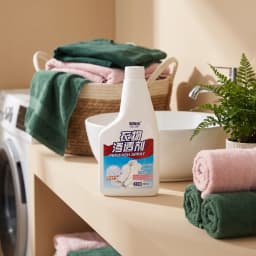White plastic bottle of pre-wash laundry stain remover with a red and blue label, showing a white shirt, 300ml volume - view 1
