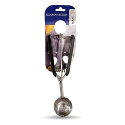Silver metal ice cream scoop with black rubber handles on a retail card against a light wooden background - view 2