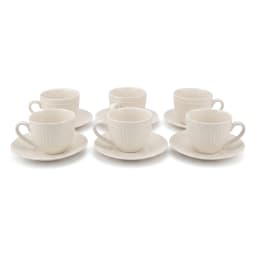 Six cream porcelain coffee cups with ribbed design and matching saucers, filled with coffee, on a rustic wooden table in a l… - view 3
