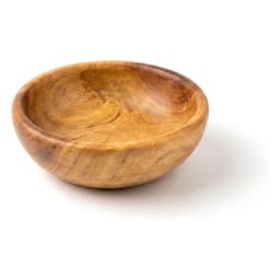 Round light brown wooden serving bowl filled with fresh mixed berries (raspberries, blueberries, blackberries) on a white ki… - view 2