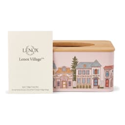 Rectangular light pink metal tissue box with a wooden lid and colorful village illustration. - view 2