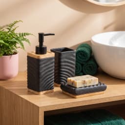 Three-piece black ceramic bathroom set with wavy texture and wooden bases, including a soap dispenser, holder, and soap dish. - view 1