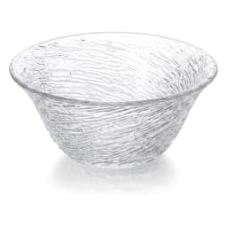 Clear glass serving bowl with a textured, rippled surface and a slightly flared rim on a white background - view 2