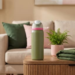 Olive green stainless steel insulated water bottle with a light green and pink push-button lid, 945ml capacity. - view 1