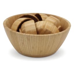 Light brown natural wood 7-piece nested bowl set on a white background, showing one large round bowl with six smaller bowls… - view 7
