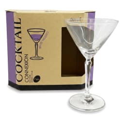 Clear glass martini cocktail glass with a faceted stem, shown with its brown and purple packaging for a set of 2. - view 2
