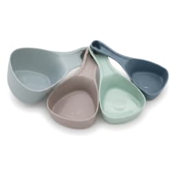 Set of 4 plastic measuring cups and spoons in light blue, beige, mint green, and dark blue on a white background. - view 2