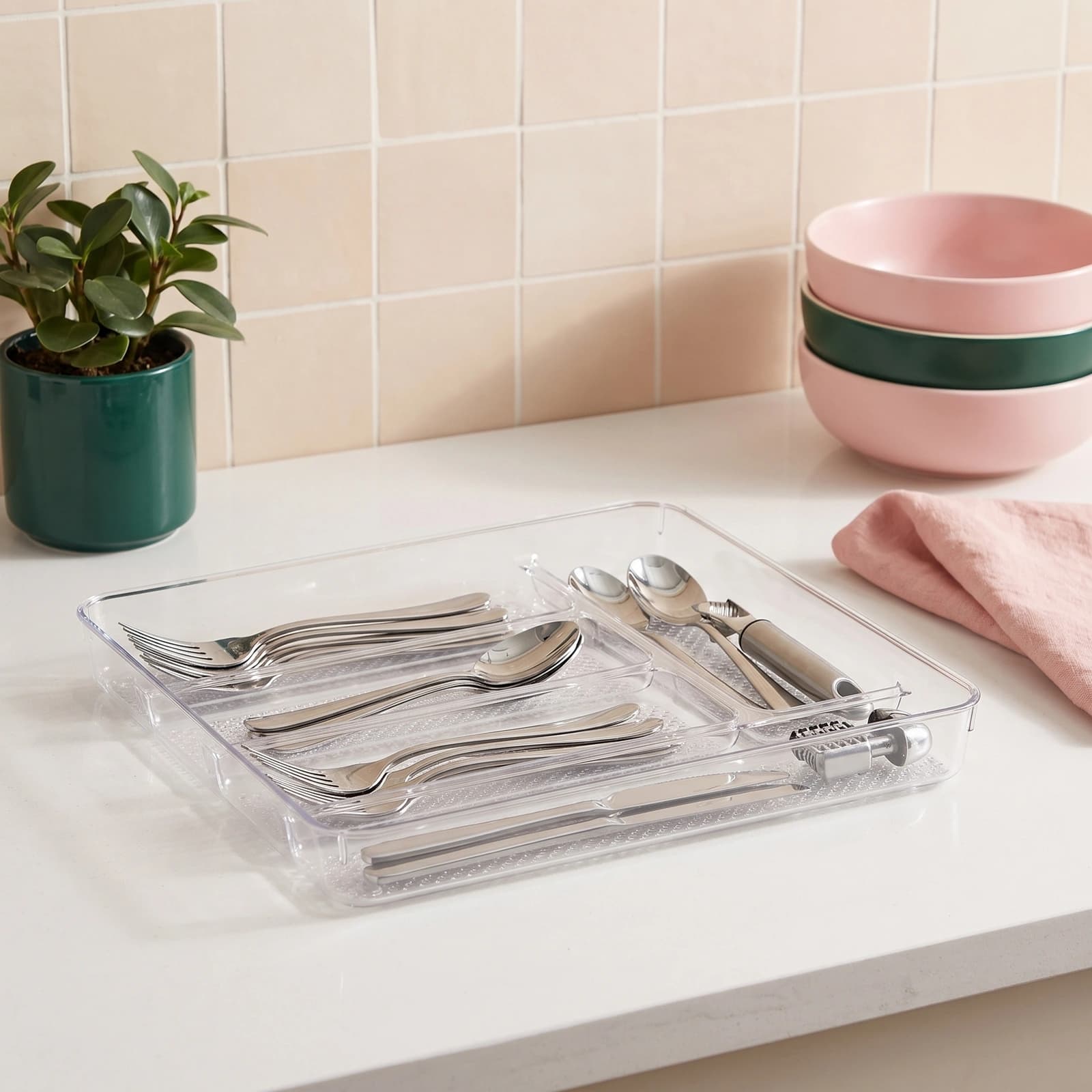 Clear rectangular acrylic multipurpose organizer tray set with textured bottom, featuring nested compartments, on a white sh…