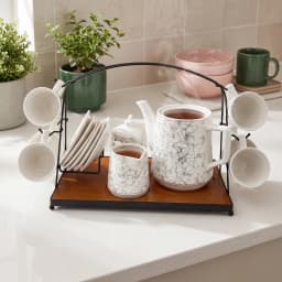 White porcelain tea set with grey and gold geometric pattern, including 6 cups, 6 saucers, teapot, sugar pot, milk jug, on a… - view 6