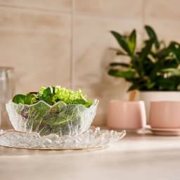 Clear textured glass serving bowl and rectangular plate with irregular wavy gold rims on a white background - view 5
