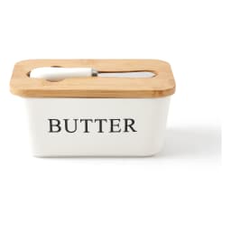 White rectangular porcelain butter dish with a light brown wooden lid and a white-handled butter knife resting in a slot. - view 2
