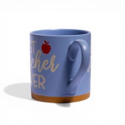 Light blue ceramic mug with 'BEST TEACHER EVER' in cream text and a small red apple icon, brown base, on white background. - view 3