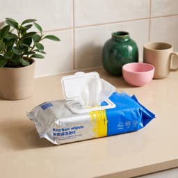 A blue, silver, and yellow pack of kitchen wipes with a white plastic lid, shown on a white background. - view 1