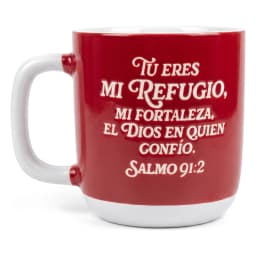 Red and white ceramic mug with a white handle and base, featuring a white inspirational Spanish quote on a white background. - view 2