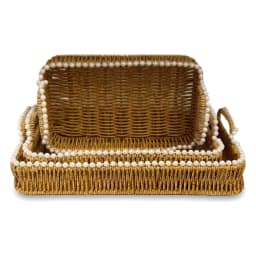 Two rectangular woven khous serving trays, brown with white pearl-like beads along the rim, stacked on a white background. - view 4