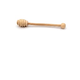 Single light brown wooden honey dipper with a grooved head and a smooth handle, placed horizontally on a white background. - view 2