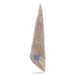 Folded beige microfiber towel with a grey elephant wearing a blue striped hat embroidered on it, on a grey textured surface. - view 3