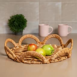 Light brown natural wicker serving tray with decorative scalloped edges on a white background - view 4