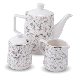 White porcelain tea set with grey and gold geometric pattern, including 6 cups, 6 saucers, teapot, sugar pot, milk jug, on a… - view 2