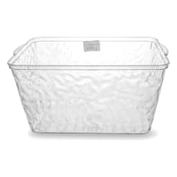 Clear rectangular acrylic storage basket with textured wavy sides, sitting on a white shelf. - view 2