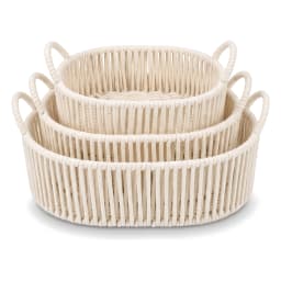 Three cream-colored oval khous nested storage baskets with integrated handles, stacked on a white background. - view 2