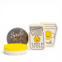 Set of yellow and white kitchen sponges, including round and shaped sponges like a mason jar with 'GOOD SMILE' text. - view 3