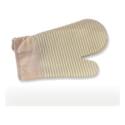 Single beige and light pink silicone and fabric oven mitt with a ribbed palm, resting in a white styrofoam tray. - view 2