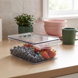 Clear rectangular acrylic storage container with a separate clear lid, on a white background, showing its transparency. - view 1