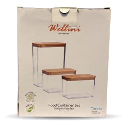 Three dark grey acrylic rectangular storage containers with light brown wooden lids on a white shelf. - view 3
