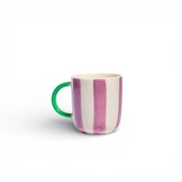 Cream ceramic mug with vertical purple stripes and a bright green handle on a white background - view 2