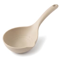 Beige silicone ladle with a light brown wooden handle, featuring a pouring spout, on a white background. - view 3