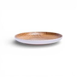 Single round ceramic plate with a white exterior and a brown wood grain patterned interior, on a white background. - view 2