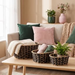 Set of three oval Khous storage baskets in black and natural beige woven pattern, stacked on a white background. - view 1