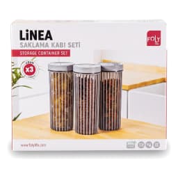 Set of three dark green cylindrical acrylic storage jars with clear bodies, filled with pasta, on a white kitchen counter. - view 3