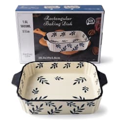 Rectangular porcelain baking dish, cream with navy blue leaf pattern and fluted sides, on a white background. - view 2